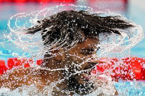 Saud Ghali competes men's 200-meter breaststroke